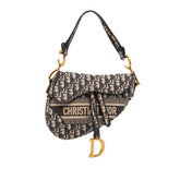 Oblique Embroidered Canvas Saddle Bag